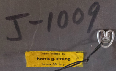 label found on Harris G Strong wall hanging
